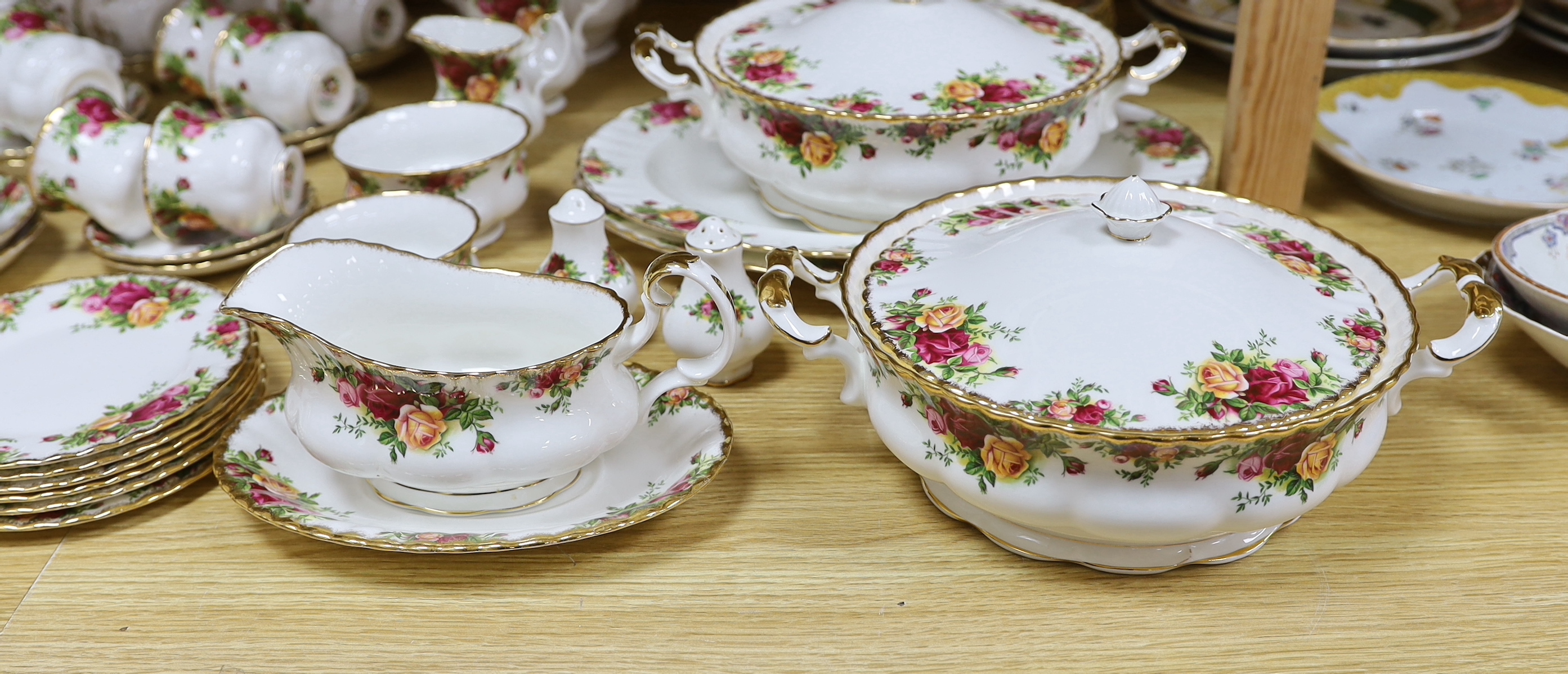 A Royal Albert Old Country Rose dinner service and tea service including trios, tureens and oval dishes